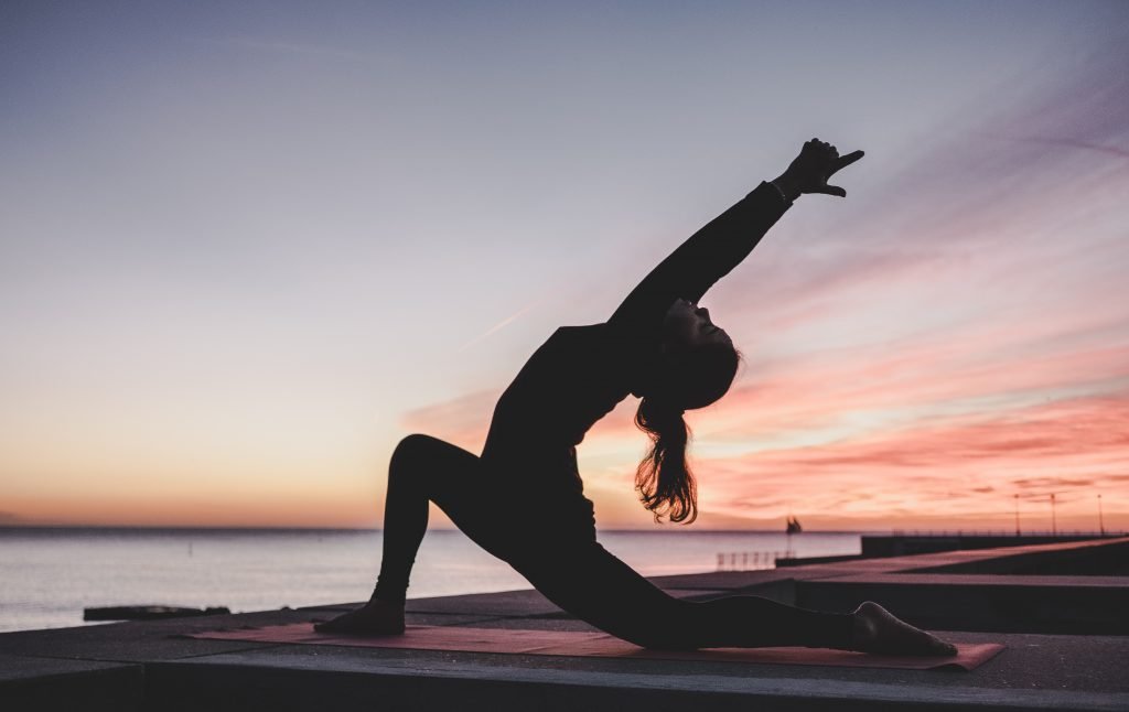 yoga woman sunset